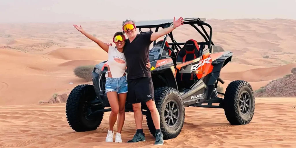 couple enjoy Dubai buggy tour